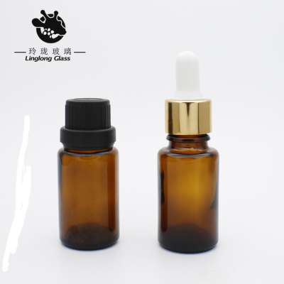 Essential oil glass drop bottle with plastic middle hole cover