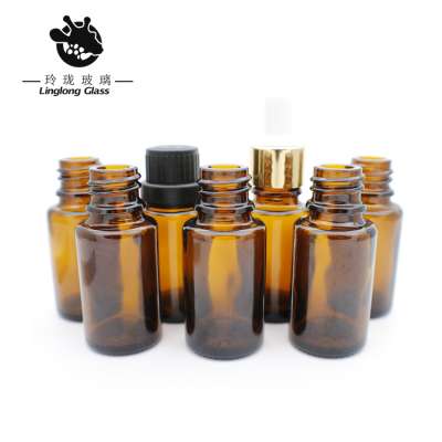 Cosmetic glass bottle for essential oil with dropper